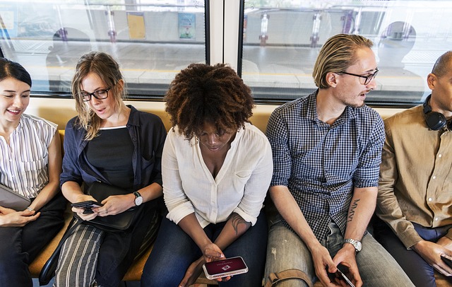 Diverse commuters sitting on a train