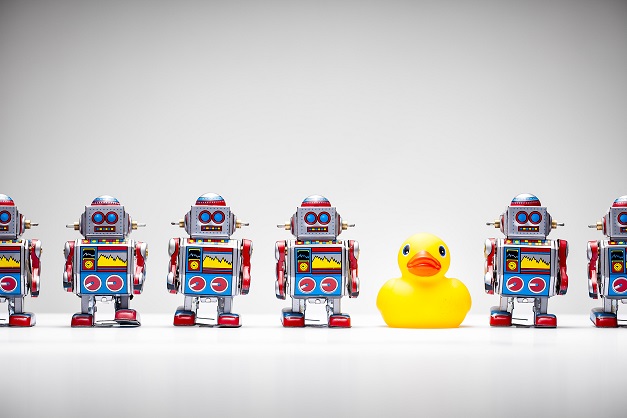 Robots and duck in a line