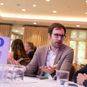 A member of the DataIQ community discussing genAI at a roundtable with peers.