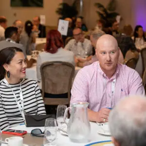 Two data leaders discussing data topics at the DataIQ Discussion event in 2022.