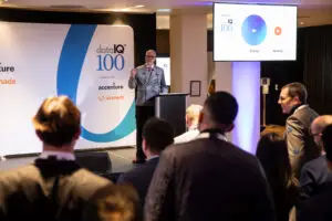 The DataIQ 100 reveals the leading data professionals for 2024 1 David Reed presenting at the 2024 DataIQ 100 Reveal.