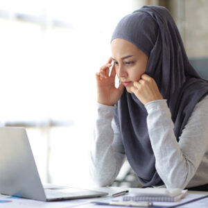 A woman working in an office.