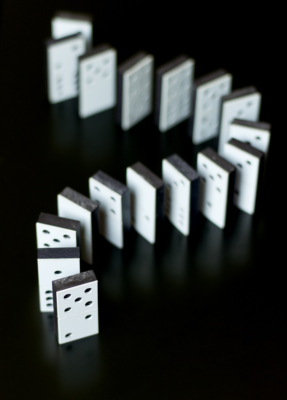 White dominoes black background