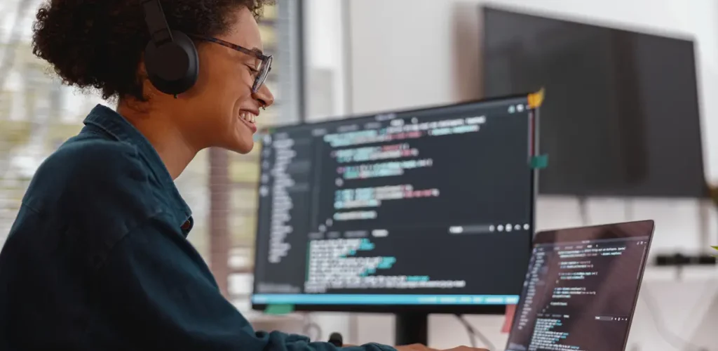 Data professional working on a computer.