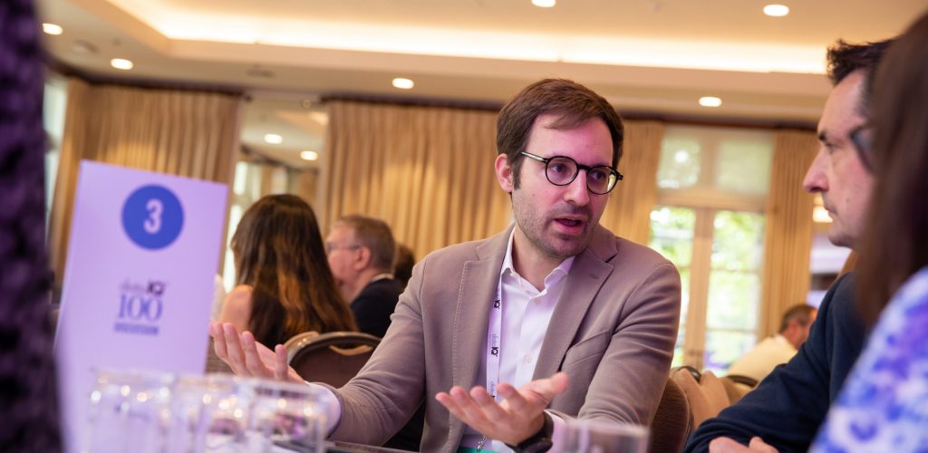 A member of DataIQ discussing genAI at a roundtable.