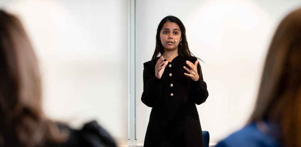 A data leader presenting to an audience.