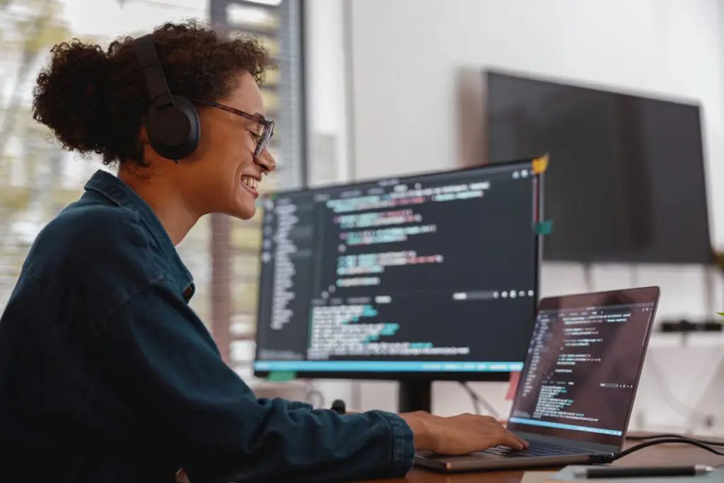 Data professional working on a computer.