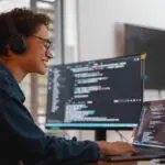 Data professional working on a computer.