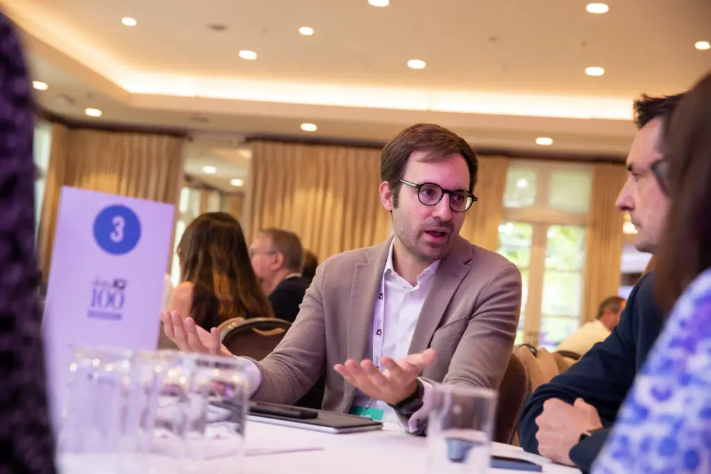 A member of DataIQ discussing genAI at a roundtable.