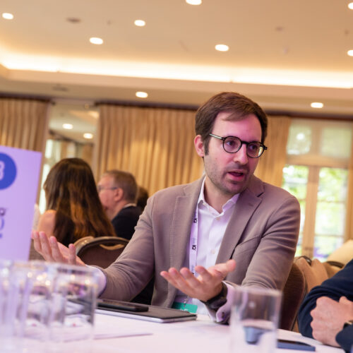 A member of DataIQ discussing genAI at a roundtable.