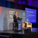 Paul on stage at Nashville Summit 2026 where decisions, agentic AI, and leadership were discussed
