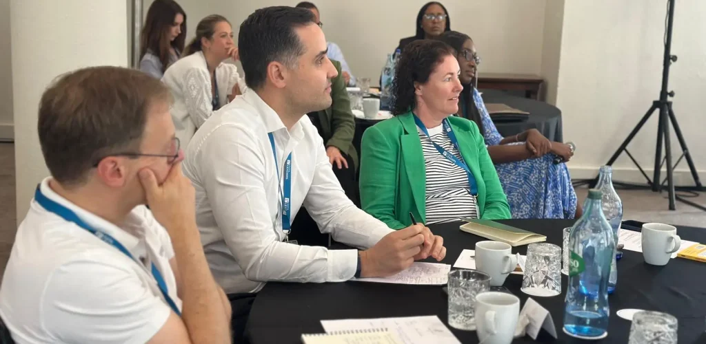 Senior Data and AI leaders at Guild 2024 in Lisbon Portugal. Small group.