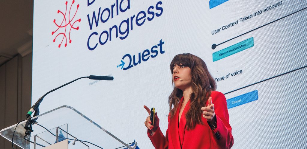 Close up of Mara Pometti, Mastercard on stage at World Congress 2025 talking about improving AI adoption