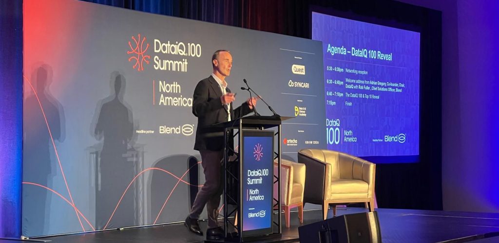 Paul on stage at Nashville Summit 2026 where decisions, agentic AI, and leadership were discussed