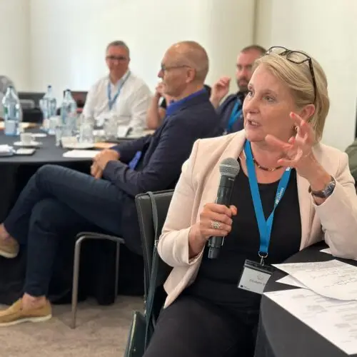Elizabeth Osta asking a leadership question at Guild 2024